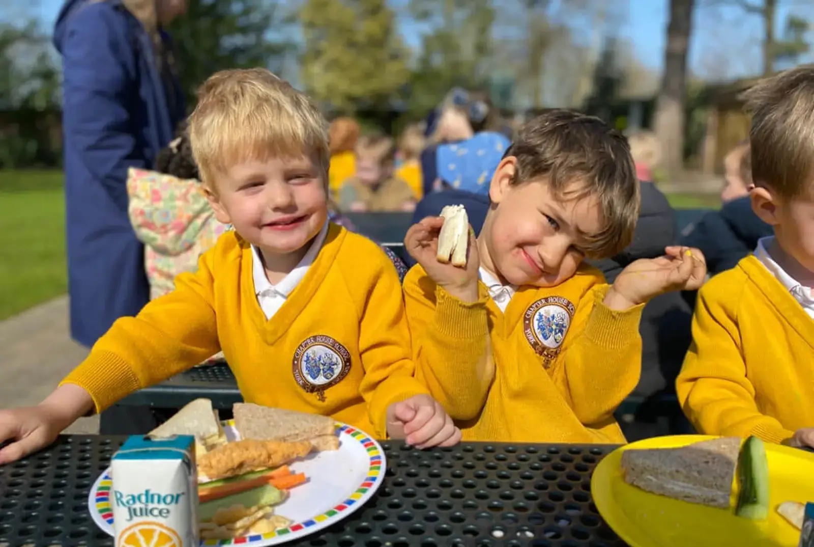 Students enjoying a picnic in Key Stage One.