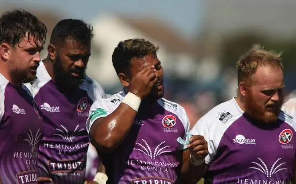 Alumnus student playing rugby. 