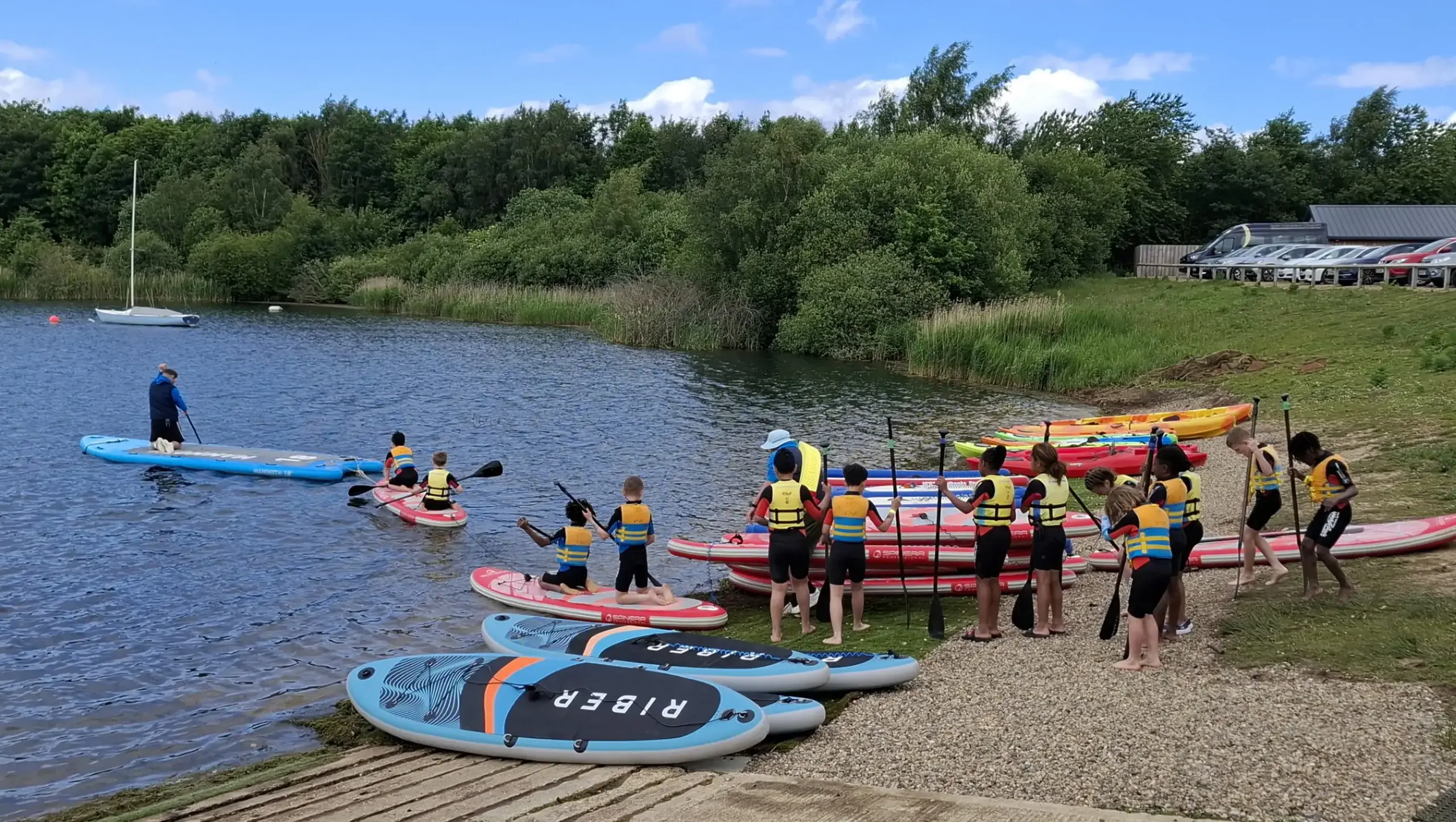 Students canoeing on a Holidays at QE trip.