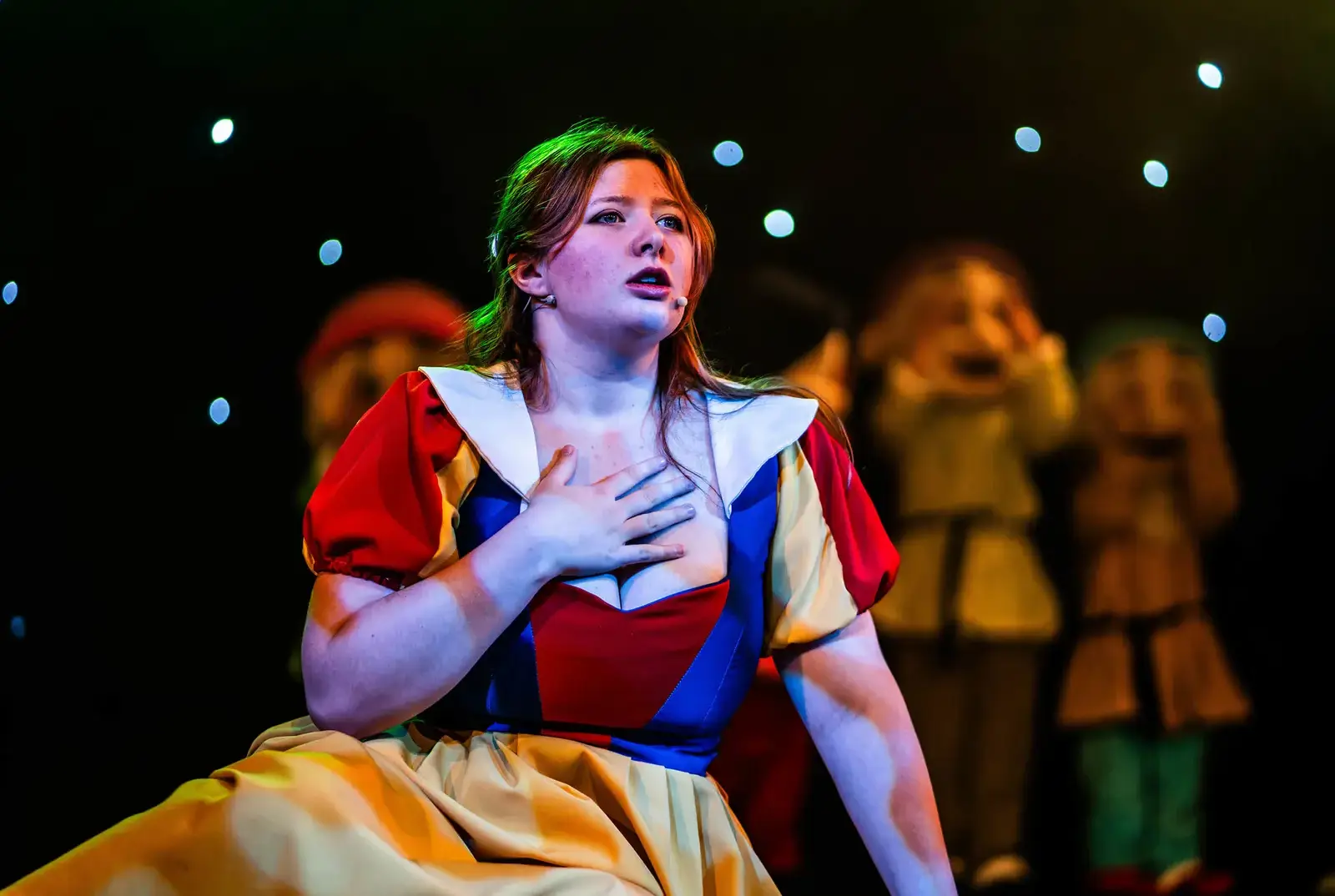 Student performing in the Sixth Form production of Snow White