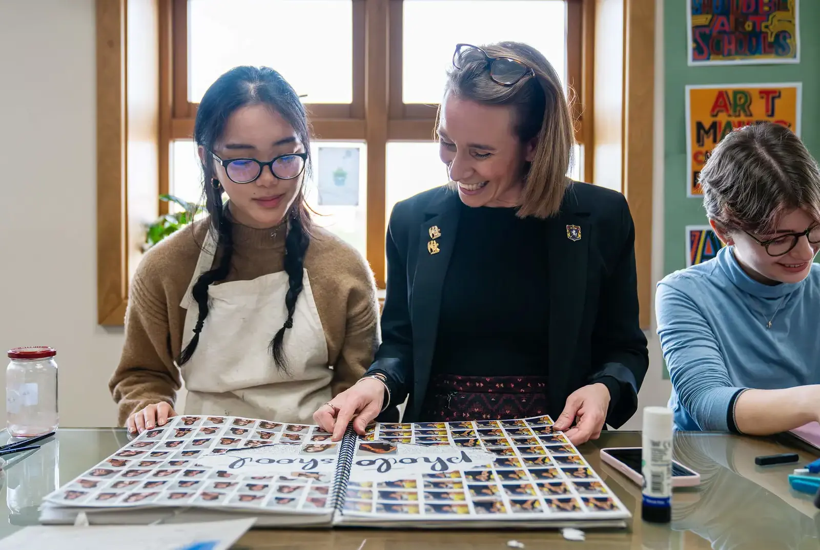 An Art Teacher with a student.