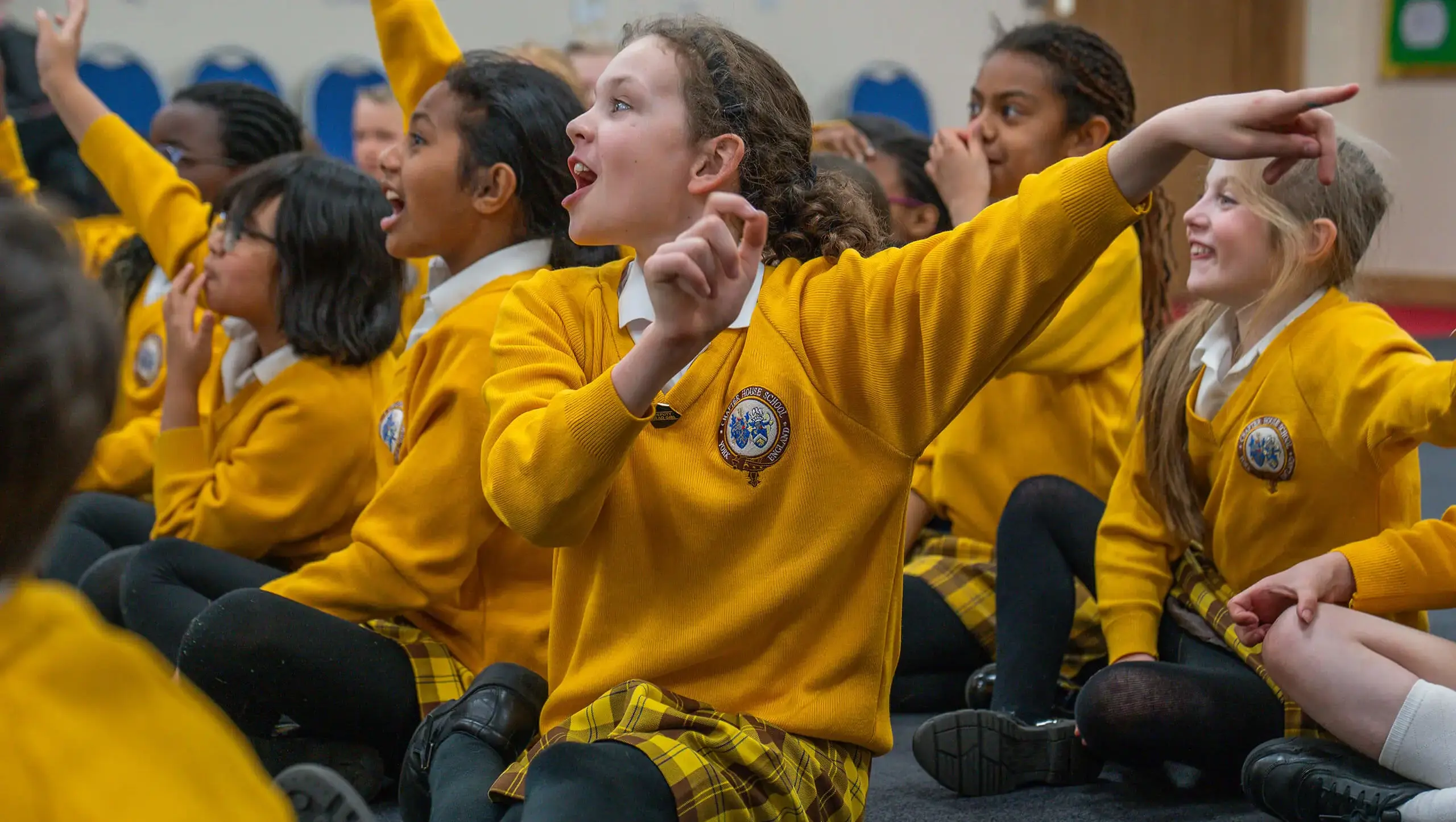 Students in a Chapter House assembly.