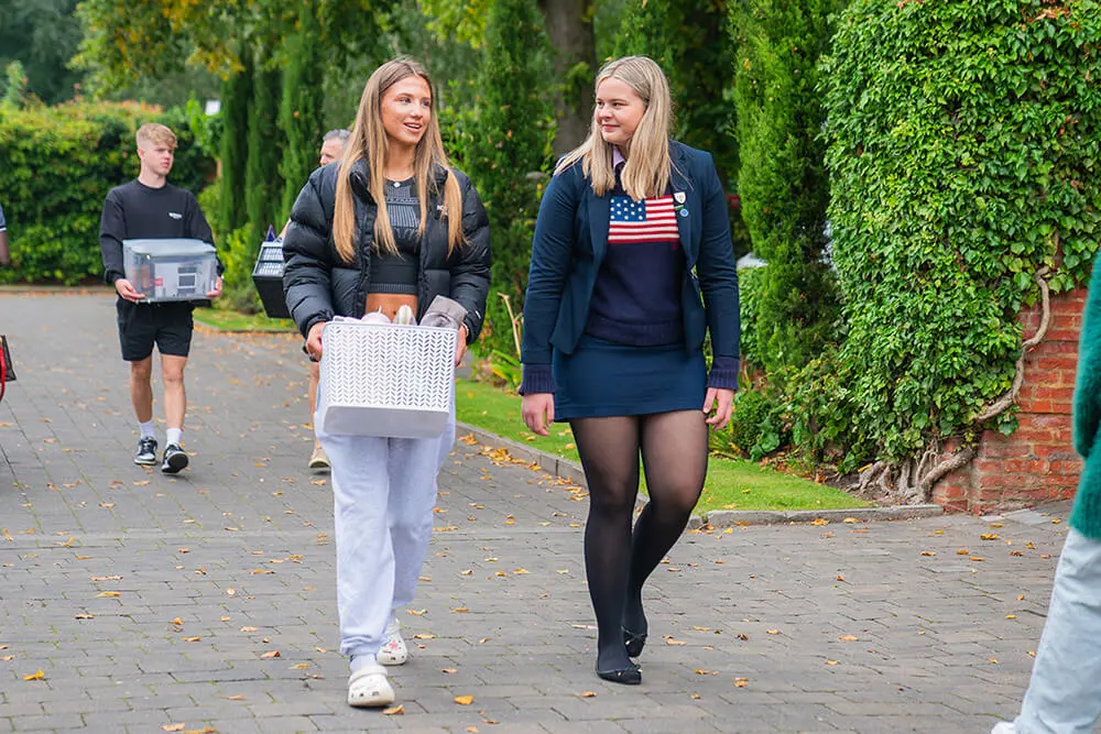 Sixth Form students arriving at Queen Ethelburga's
