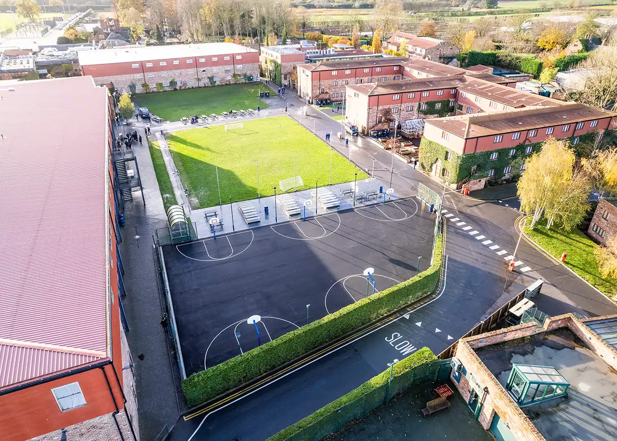 Drone photo of the boarding houses and basketball courts