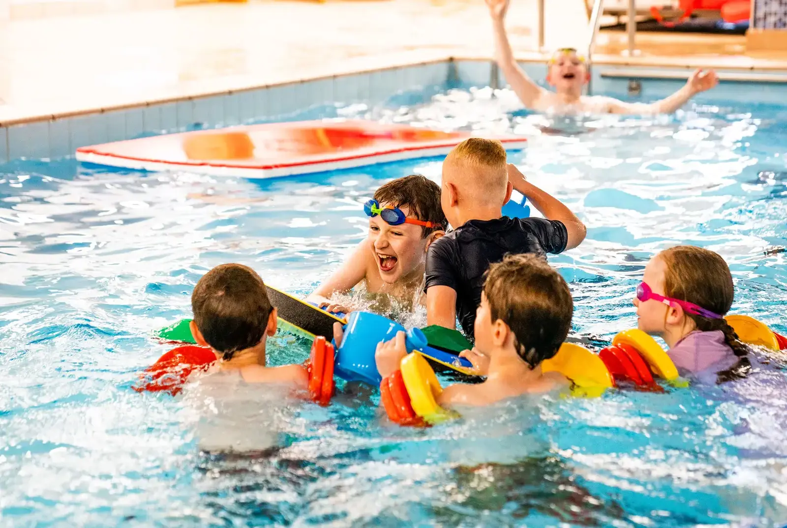 Children enjoying swimming at Queen Ethelburga's