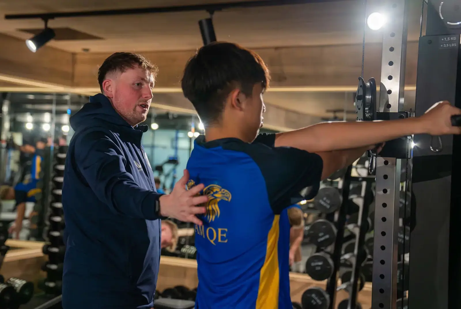 Carnegie School of Sport graduate working with a student.