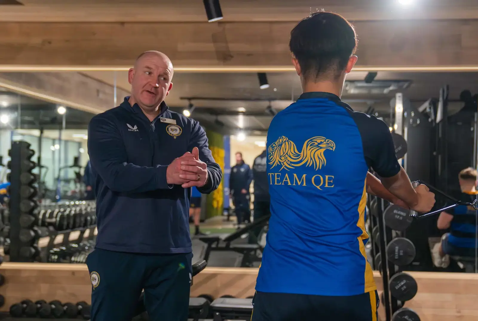 Mr Rawlinson teaching a student in the elite sport school.