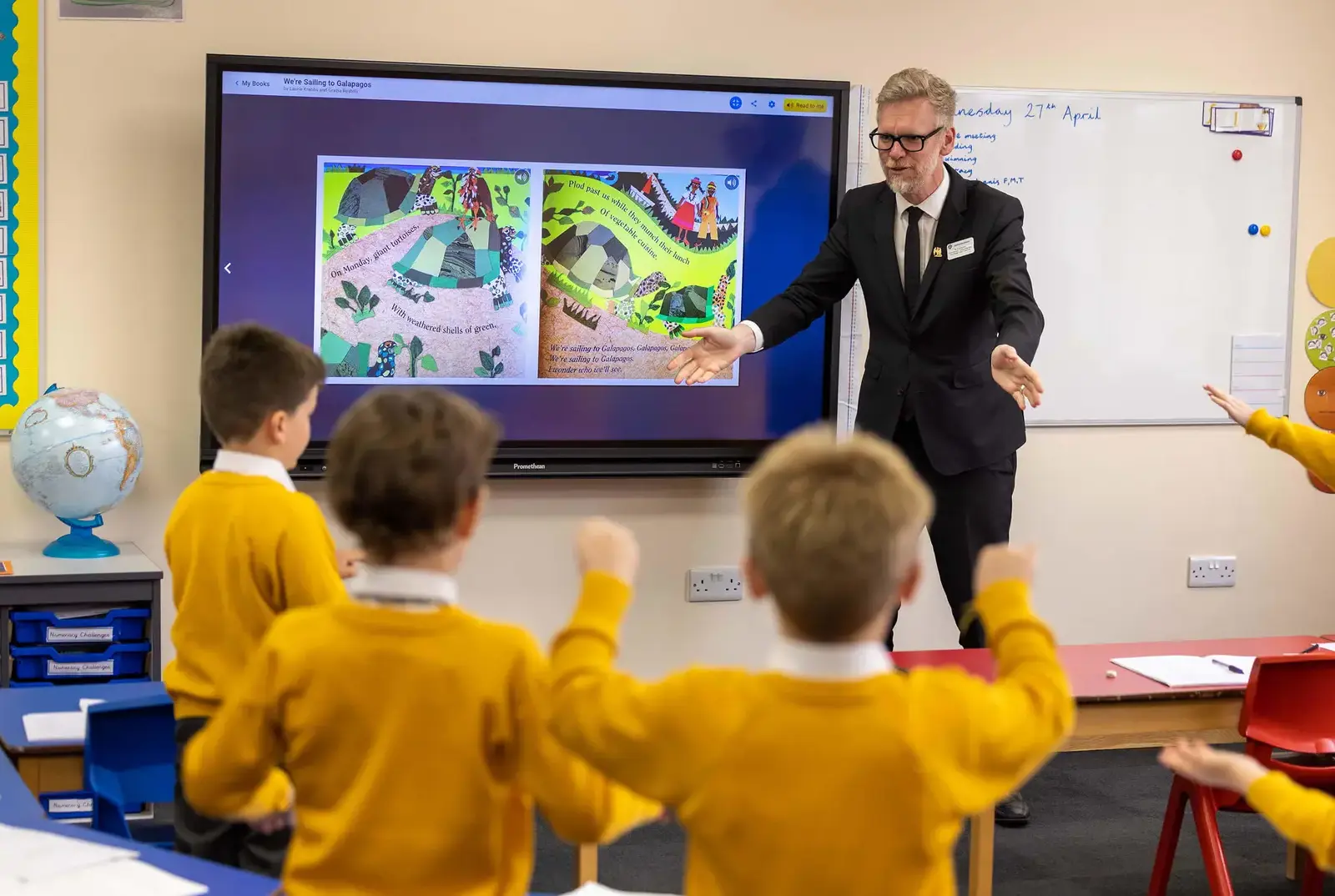 Chapter House, a primary school York, teacher in class with pupils. 