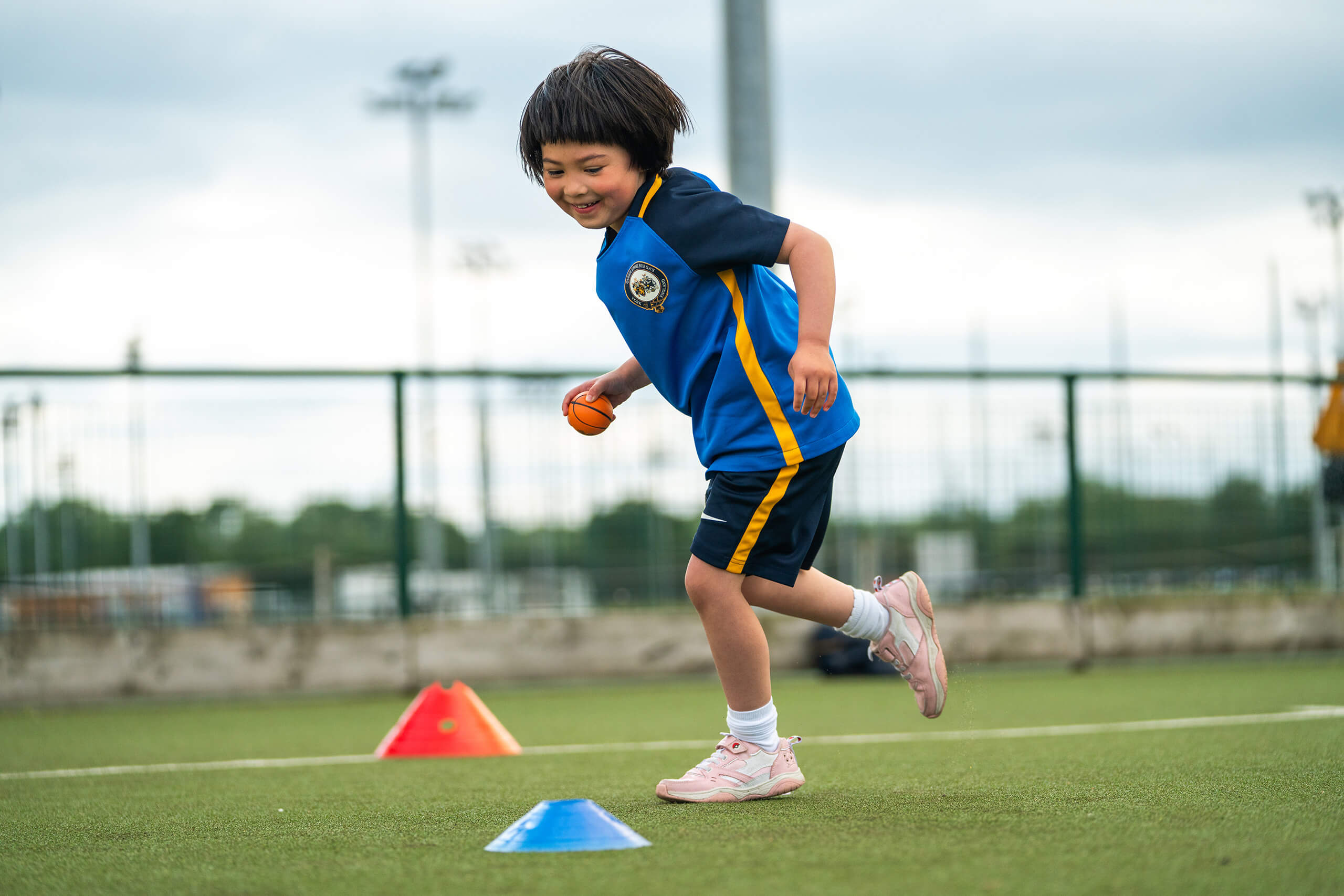 Key Stage One girl participating in movement for learning.