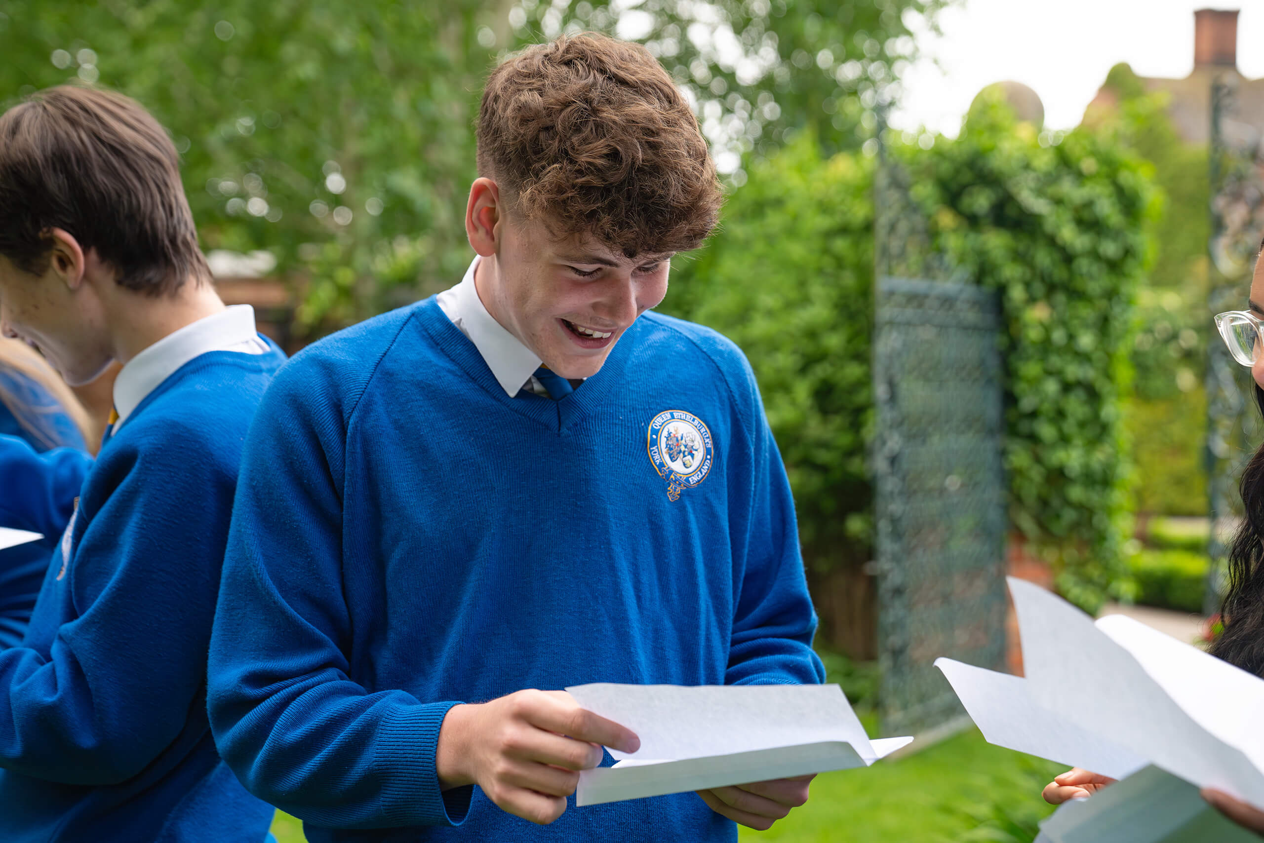 College student celebrating his GCSE results.