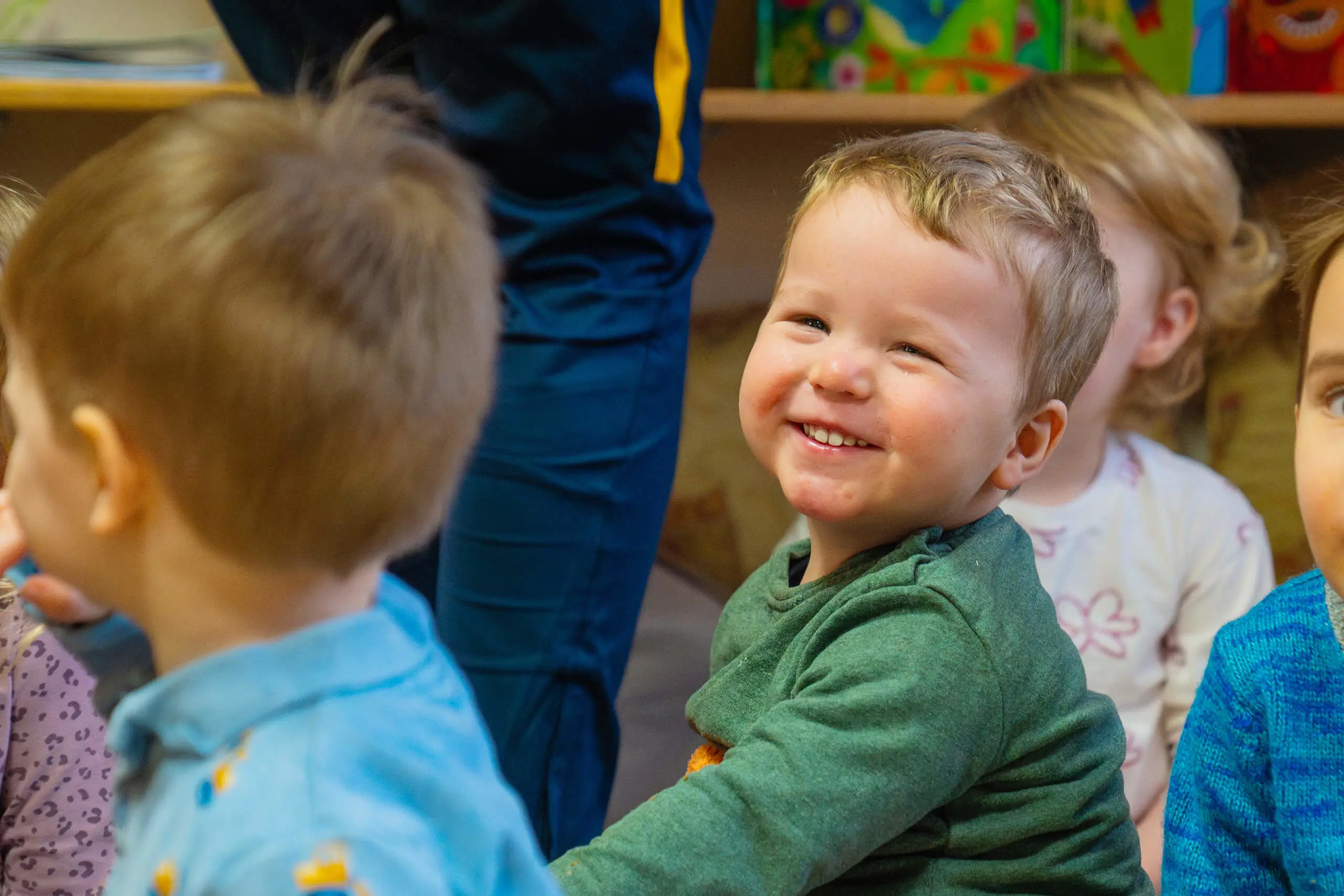 A child at Chapter House, York primary school, smiling.