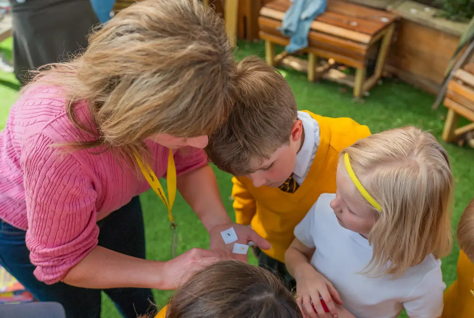 Parent talking to York Primary School children.