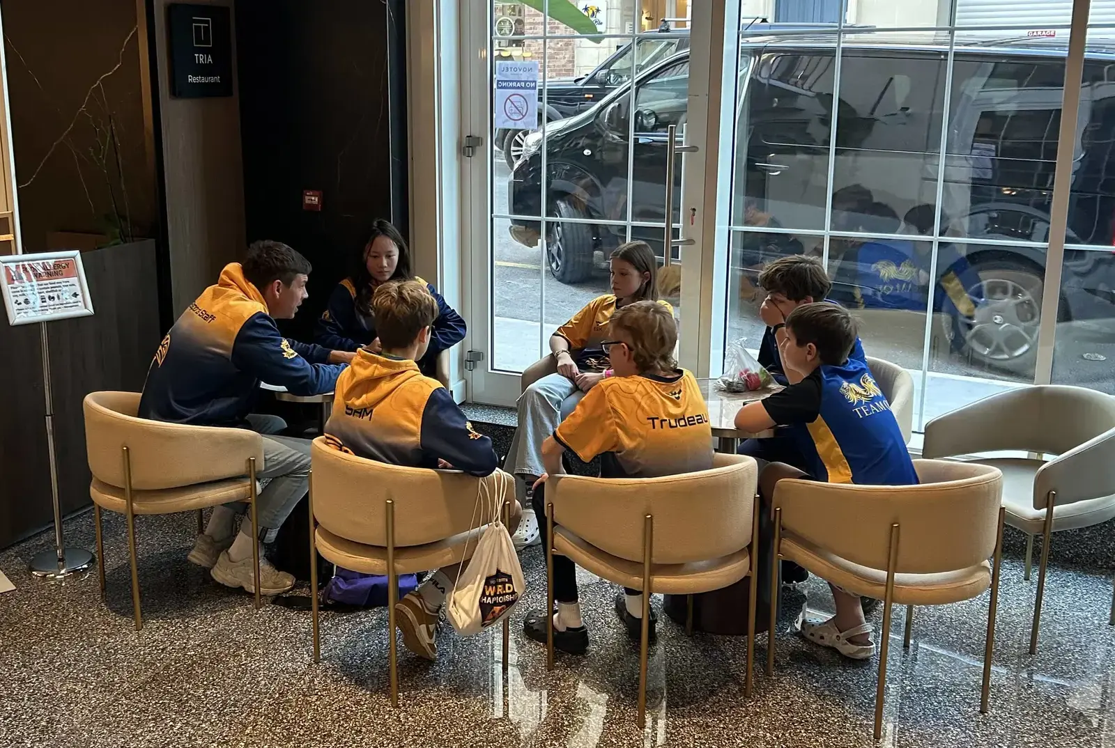 The Junior Team hearing the news.