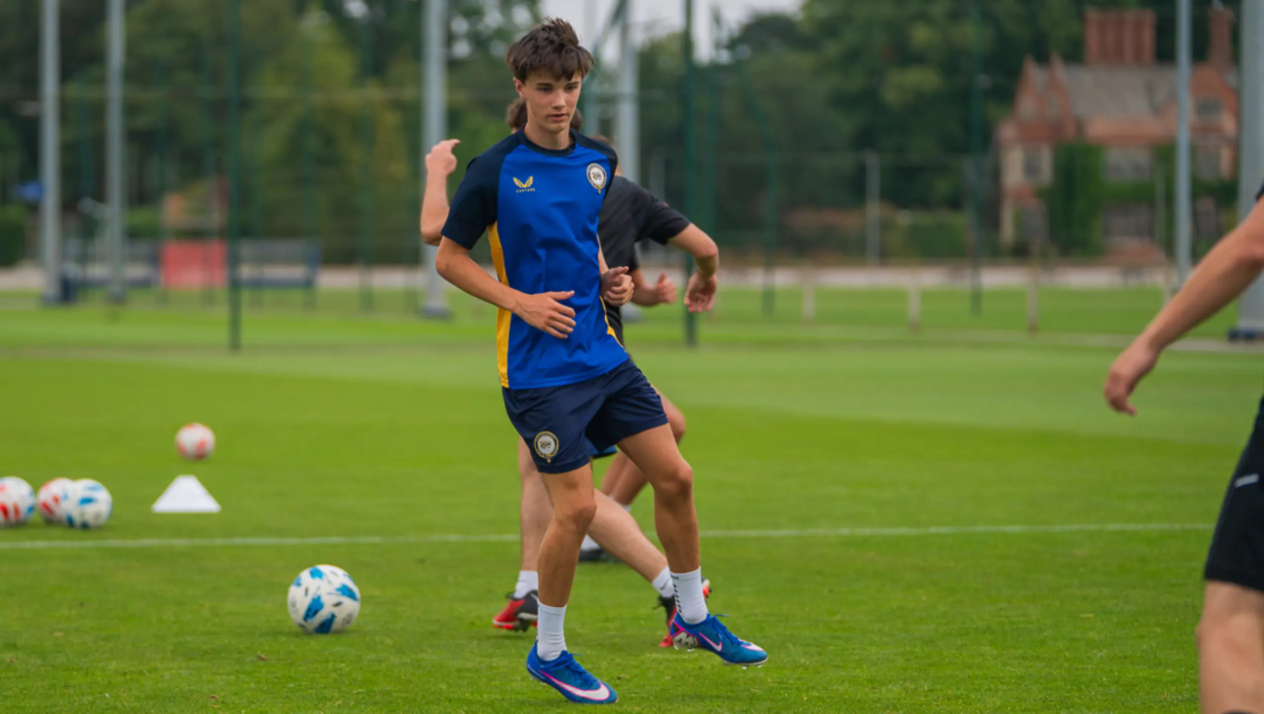 Students in football training session