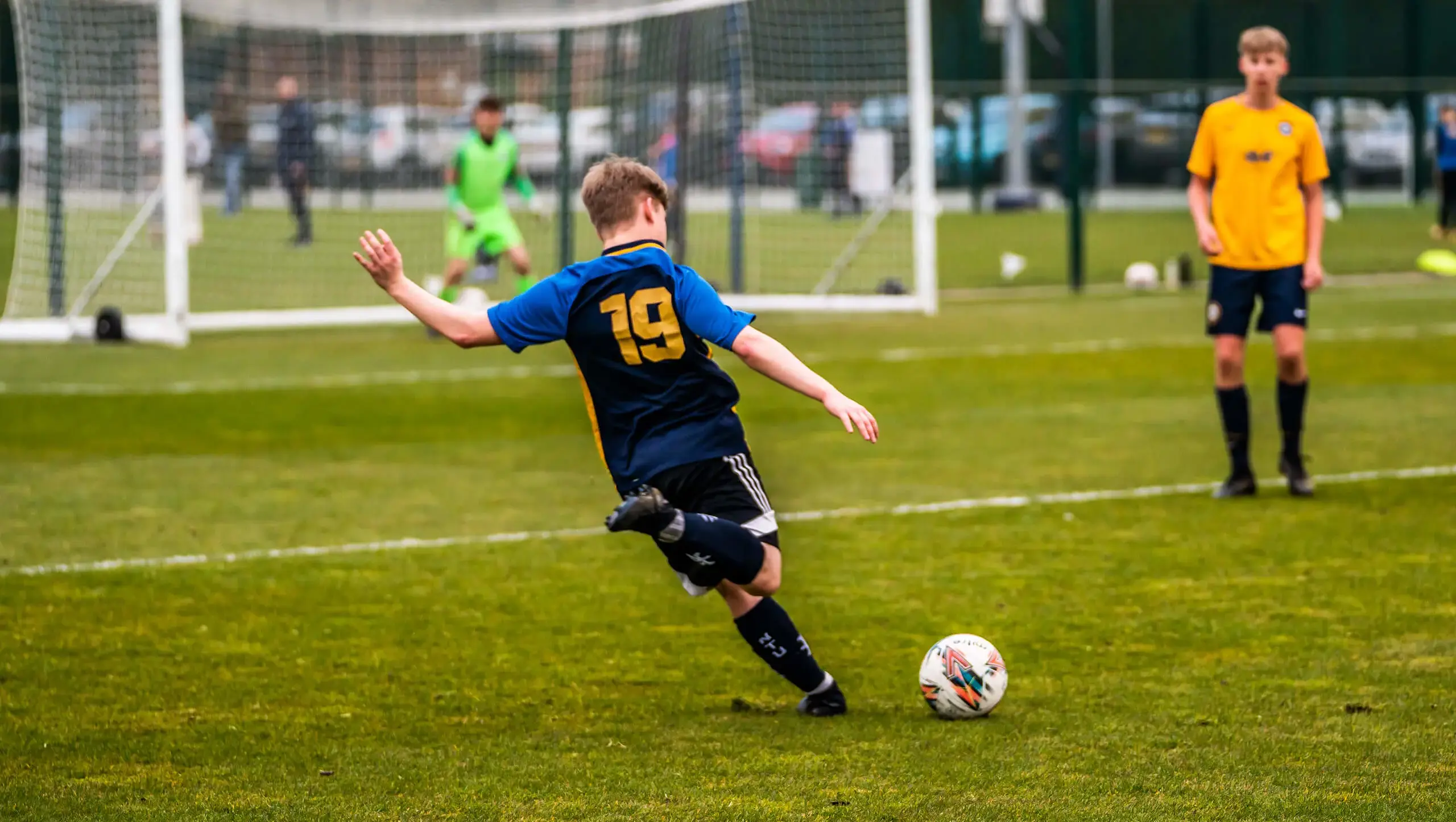 QE pupil playing football