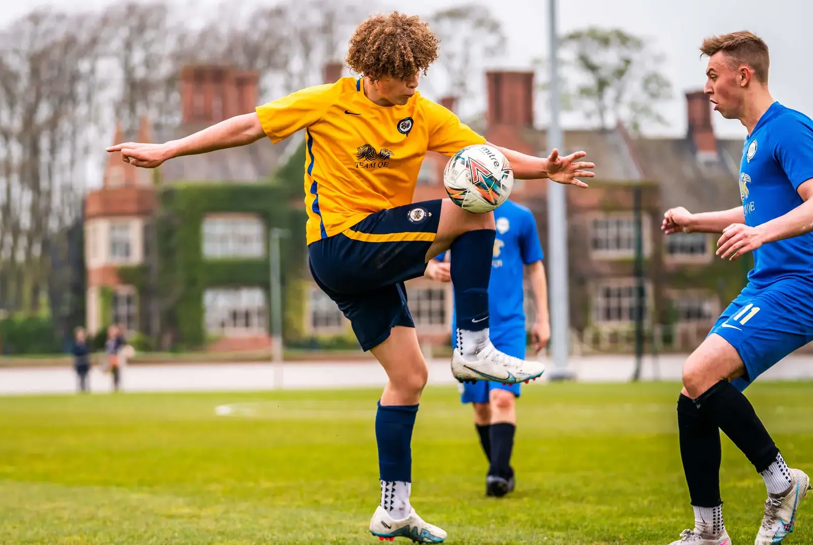 QE pupil playing football