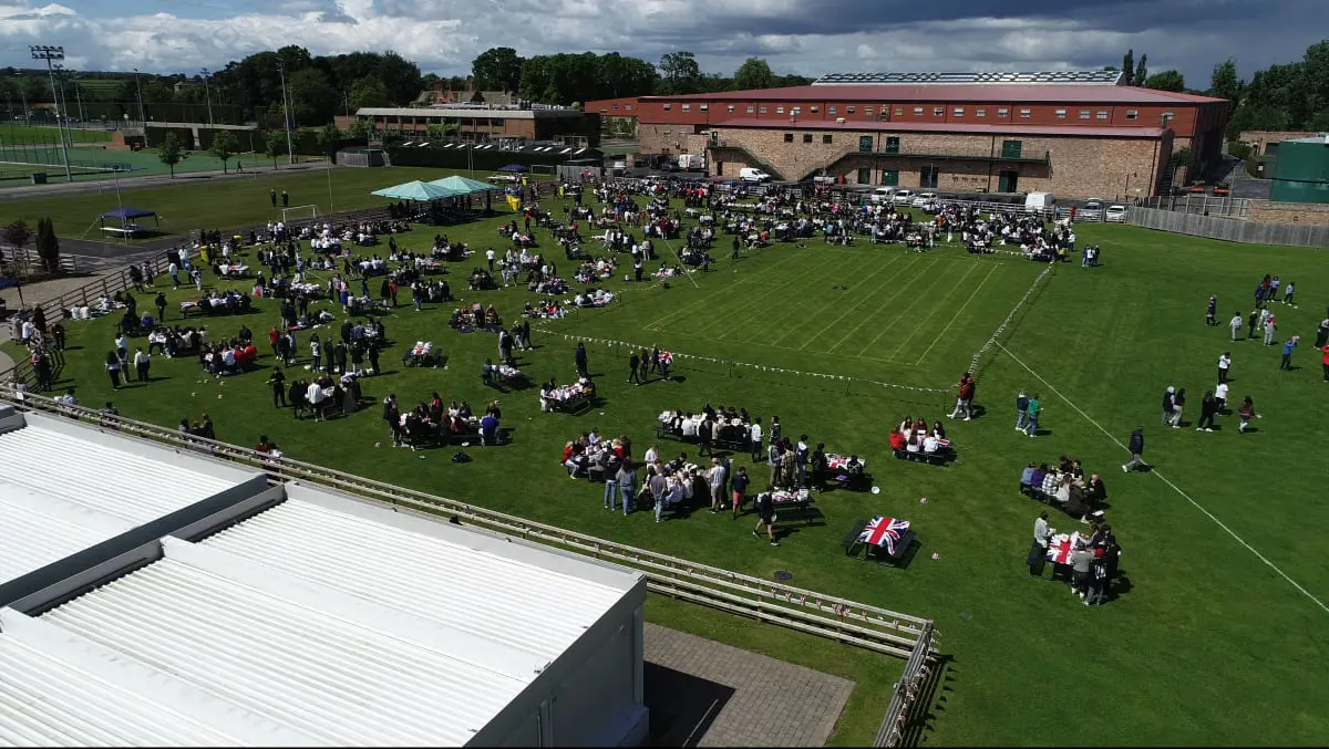 Students celebrating at The Hub at Queen Ethelburga's