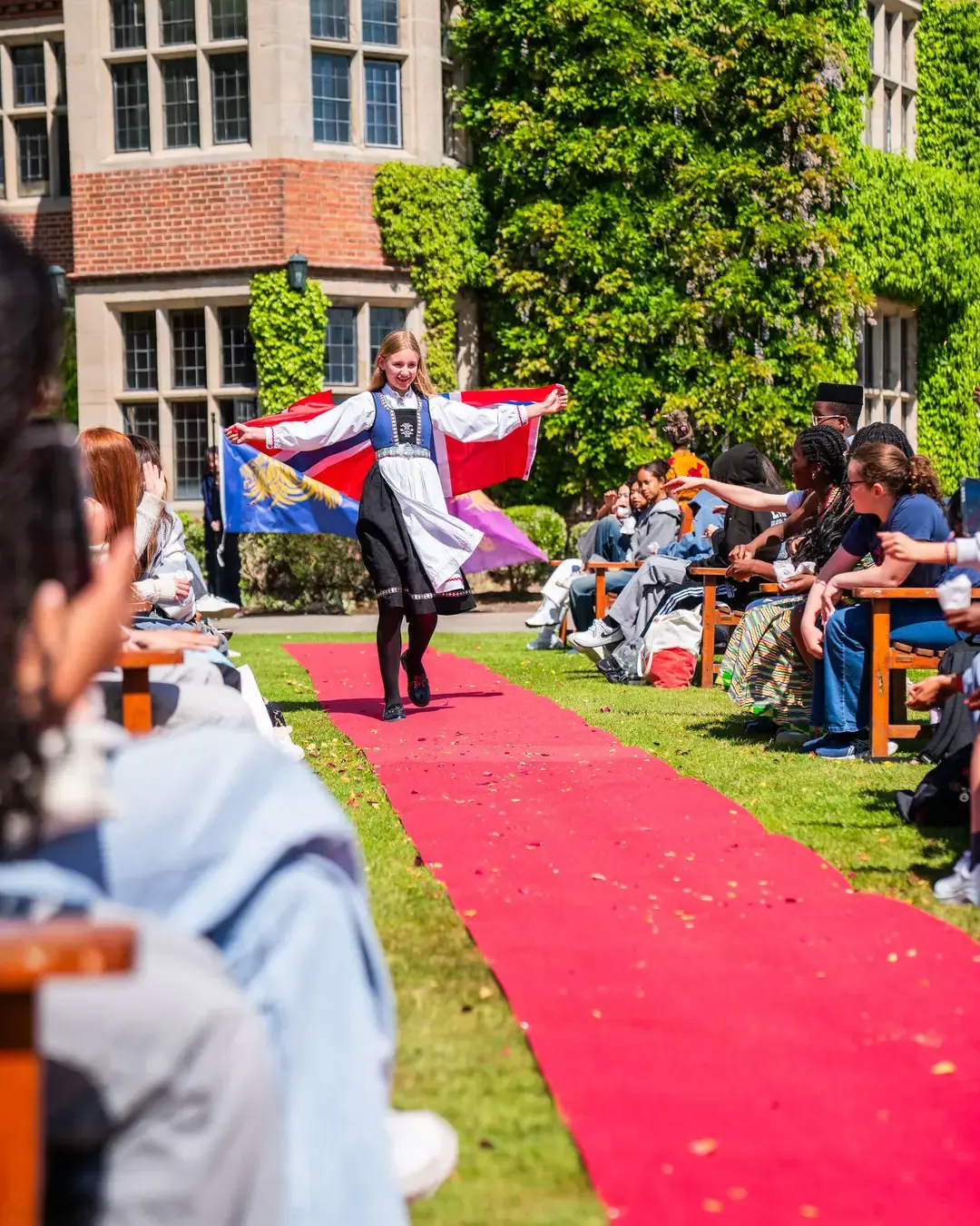 Student celebrating Cultural Awareness day with a Culture Catwalk.