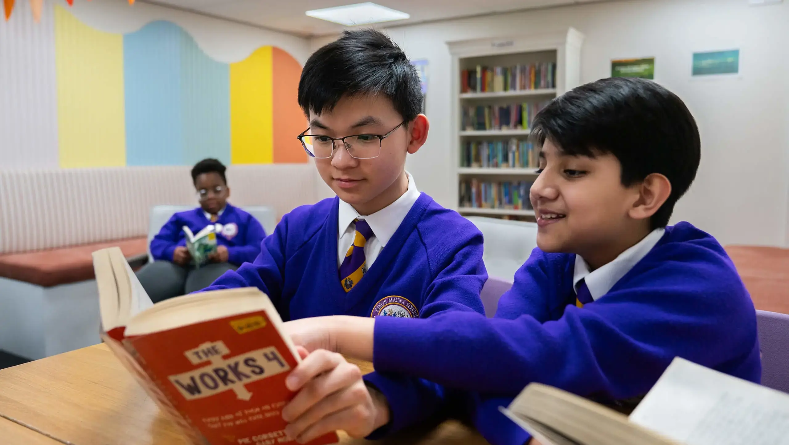 Students reading together.