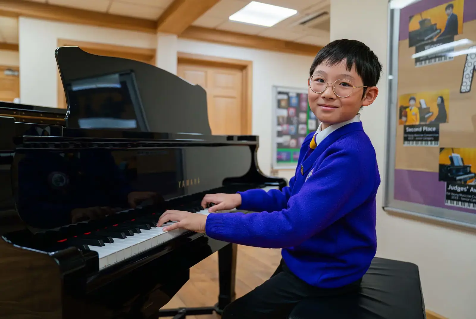 King's Magna student playing the piano.