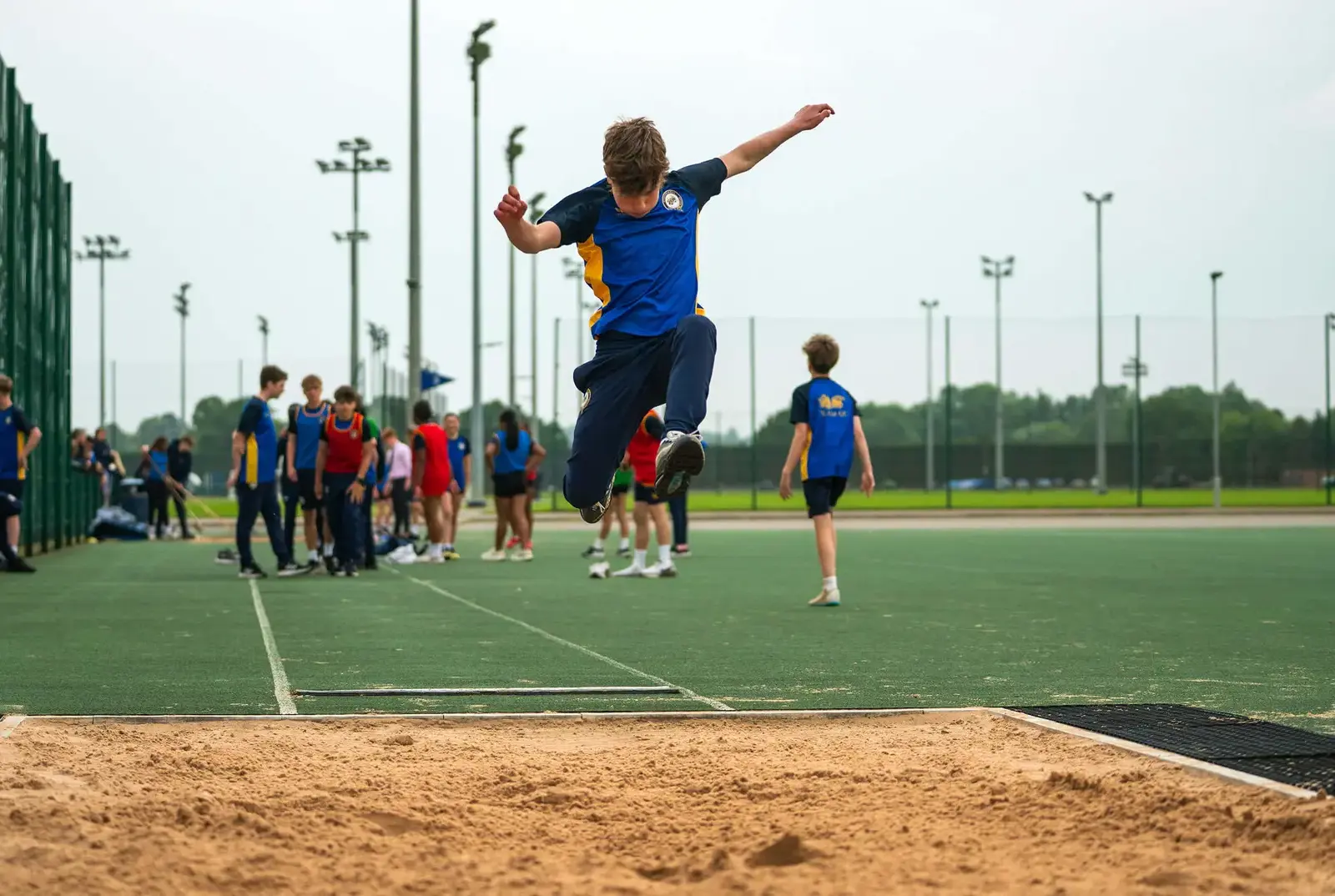 Student jumping at Independent Middle School