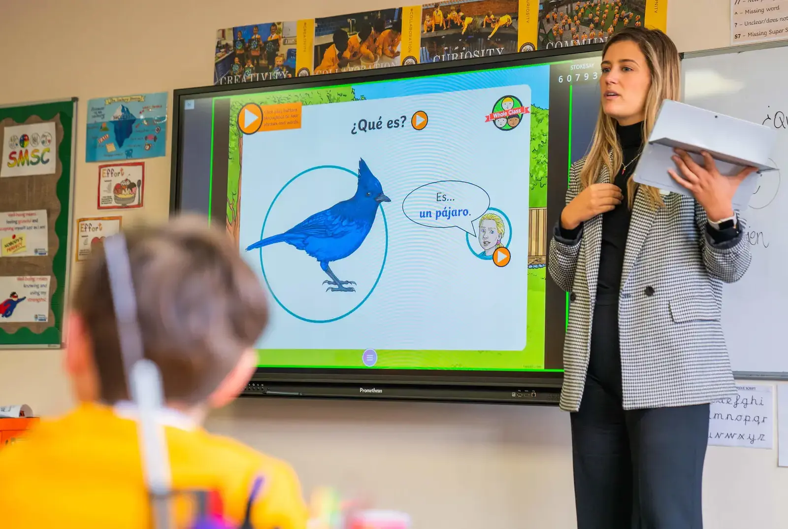 Chapter House teaching teaching Spanish to her class.