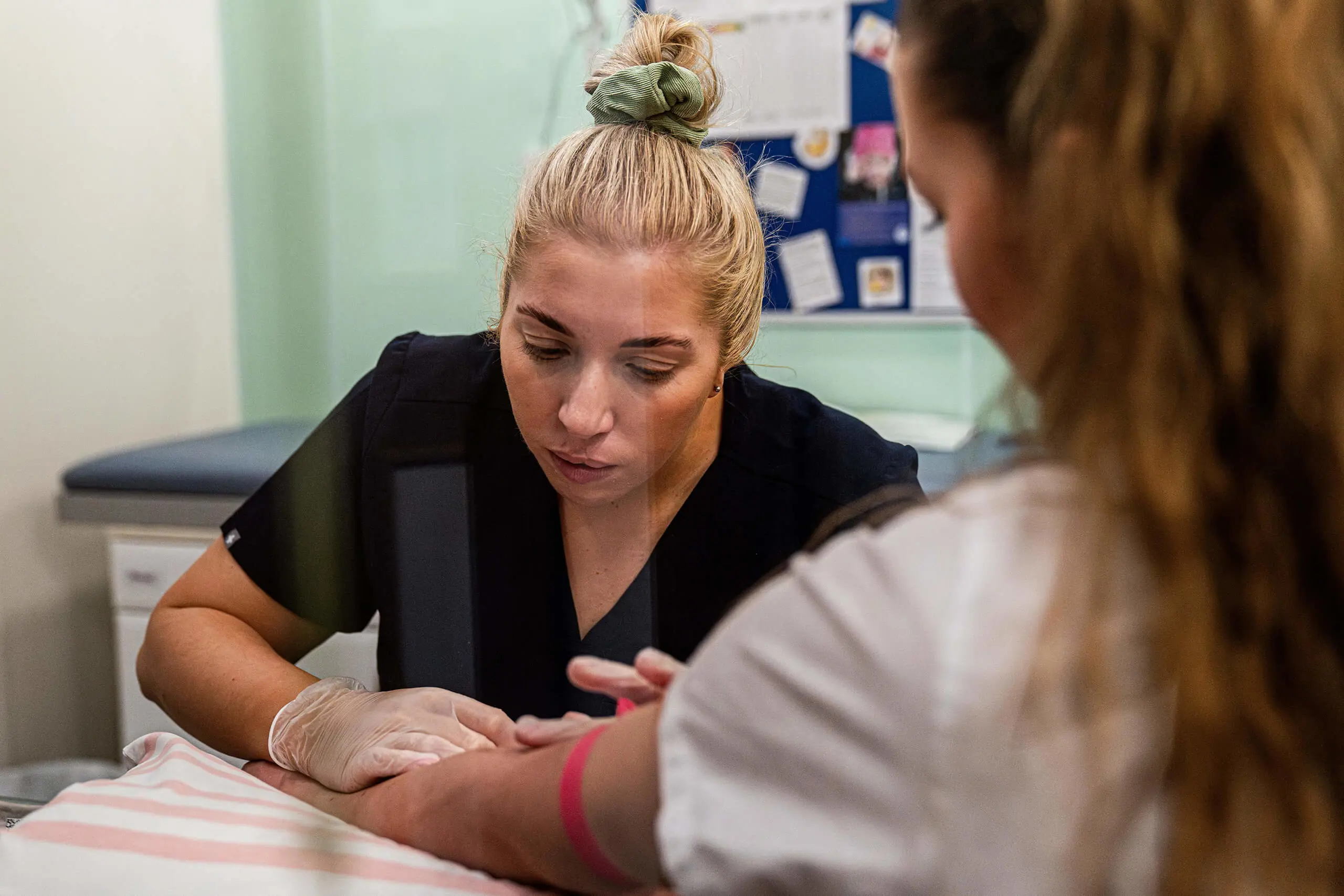 Student receiving a jab at Queen Ethelburga's Medical Centre.