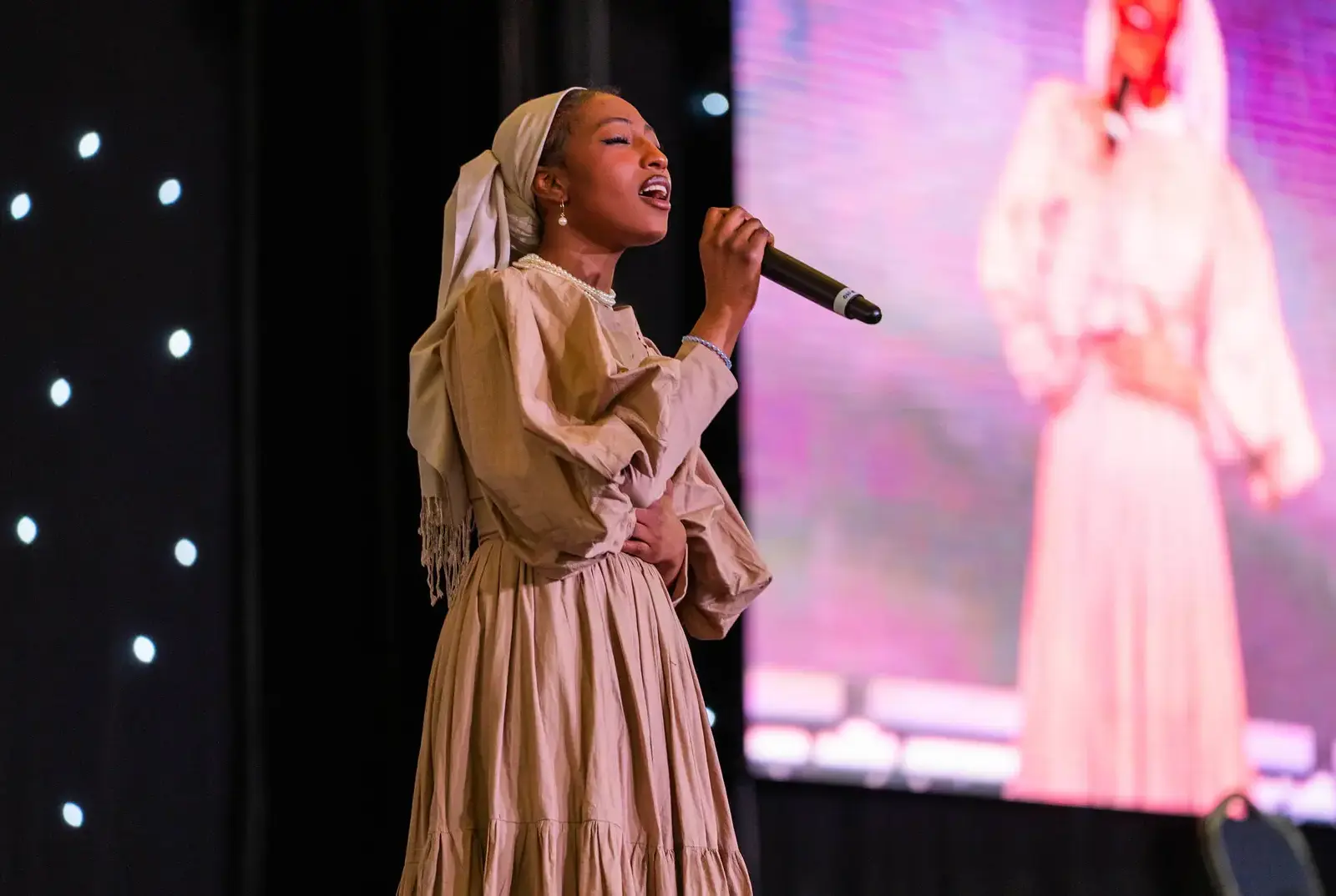 Student singing at Speech Day.