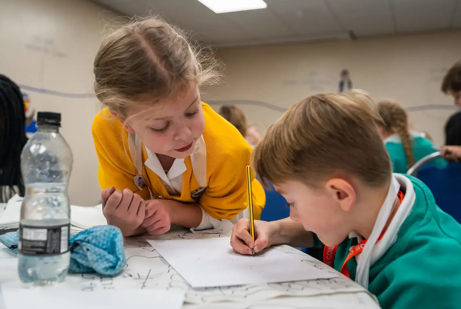 Students from different schools working together in an Outreach event. 