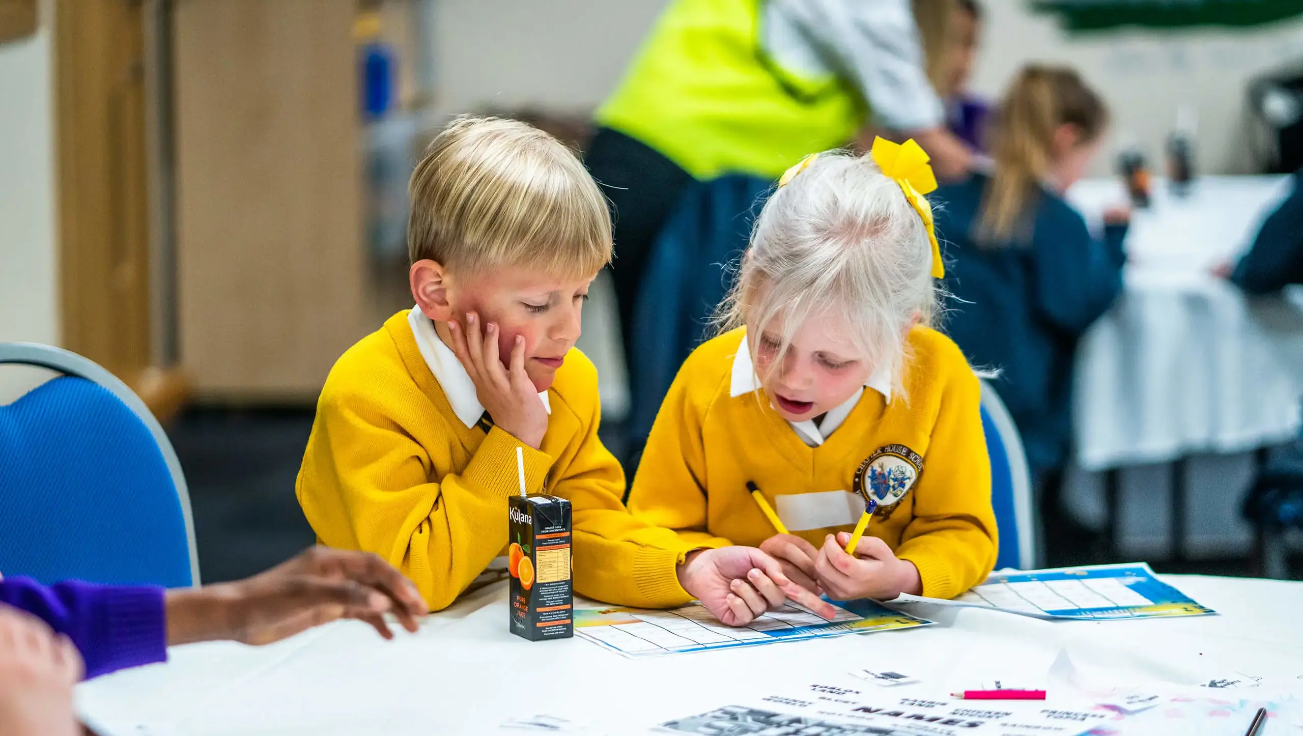 Boy and girl working together in class at Chapter House School, Queen Ethelburga's