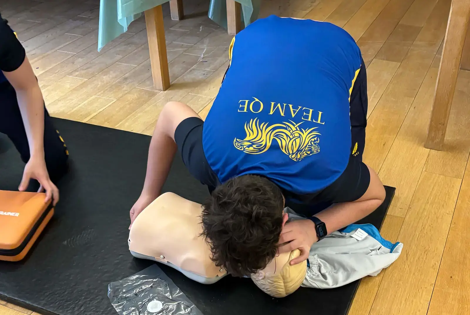 Students learning first aid as part of the Personal Development lessons.
