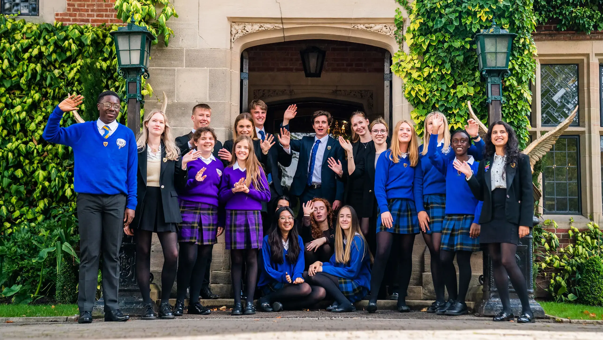 Pupils outside the school building at QE