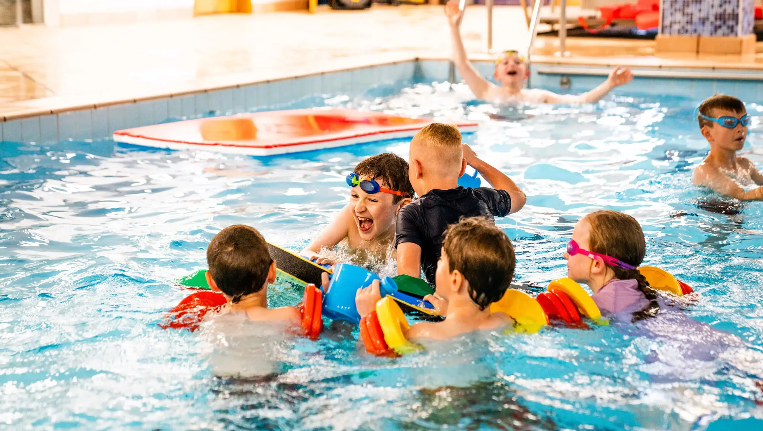 Children swimming at Queen Ethelburga's