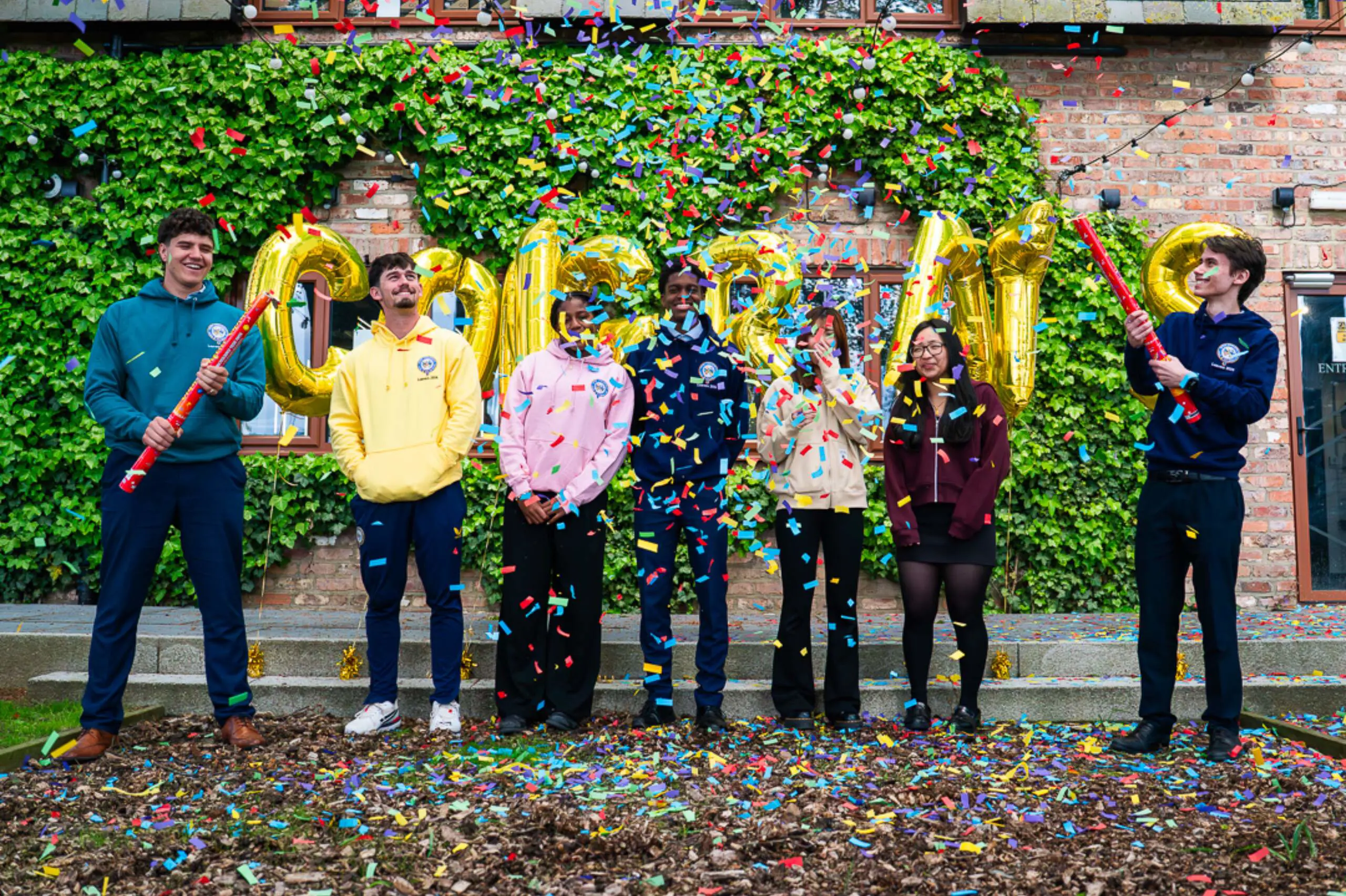Students at Queen Ethelburga's, a private day and boarding school, celebrating A Level Results