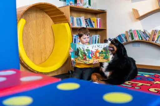 Instilling the Love of Literacy from the Roots of Chapter House with our reading dog