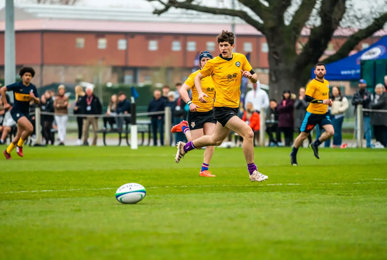 QE pupils playing rugby