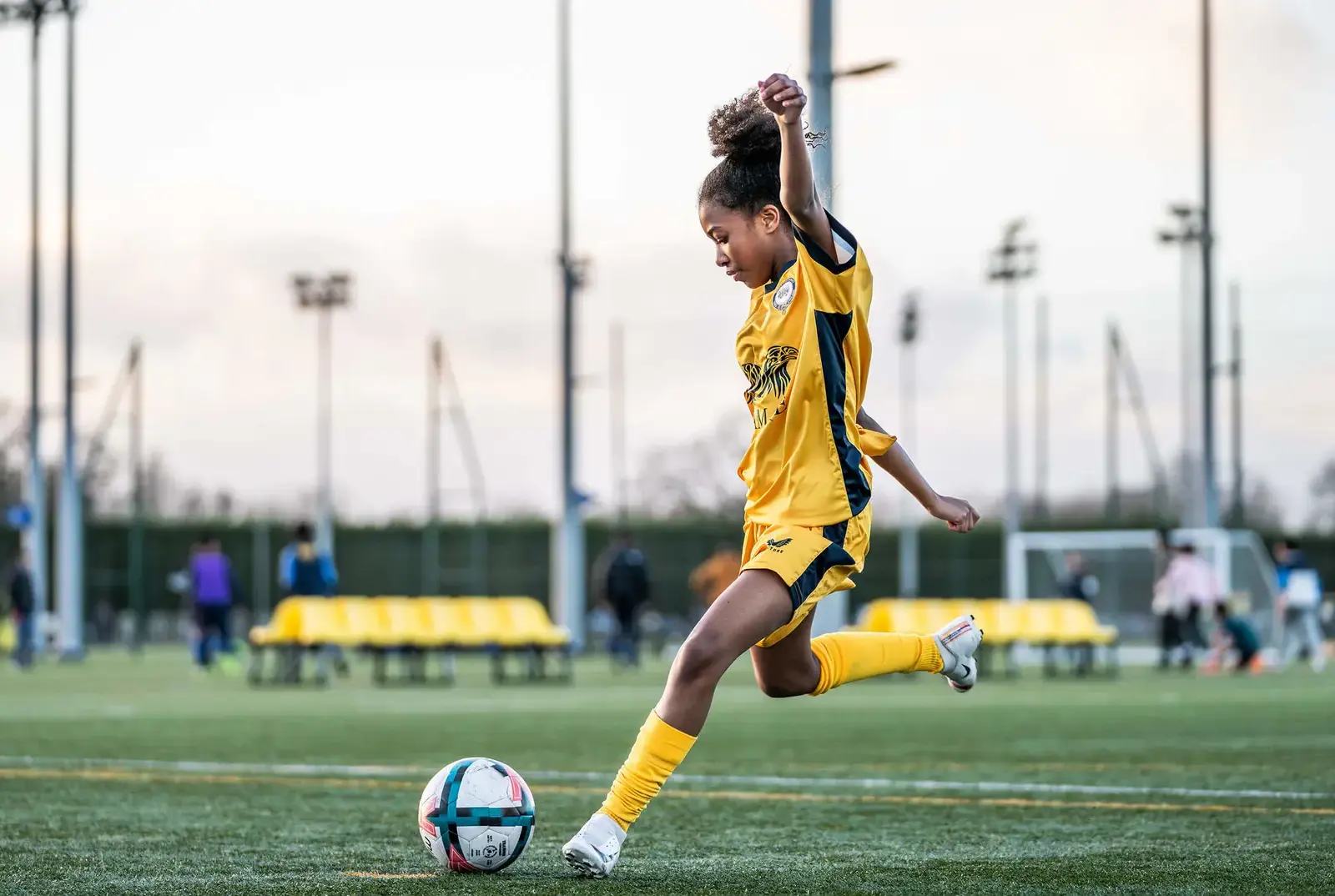 Girls football scholarship opportunities at Queen Ethelburga's Collegiate.