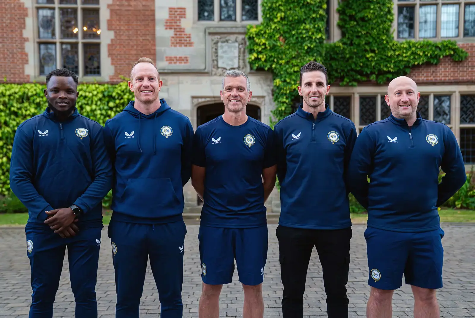 The football coaches at Queen Ethelburga's.