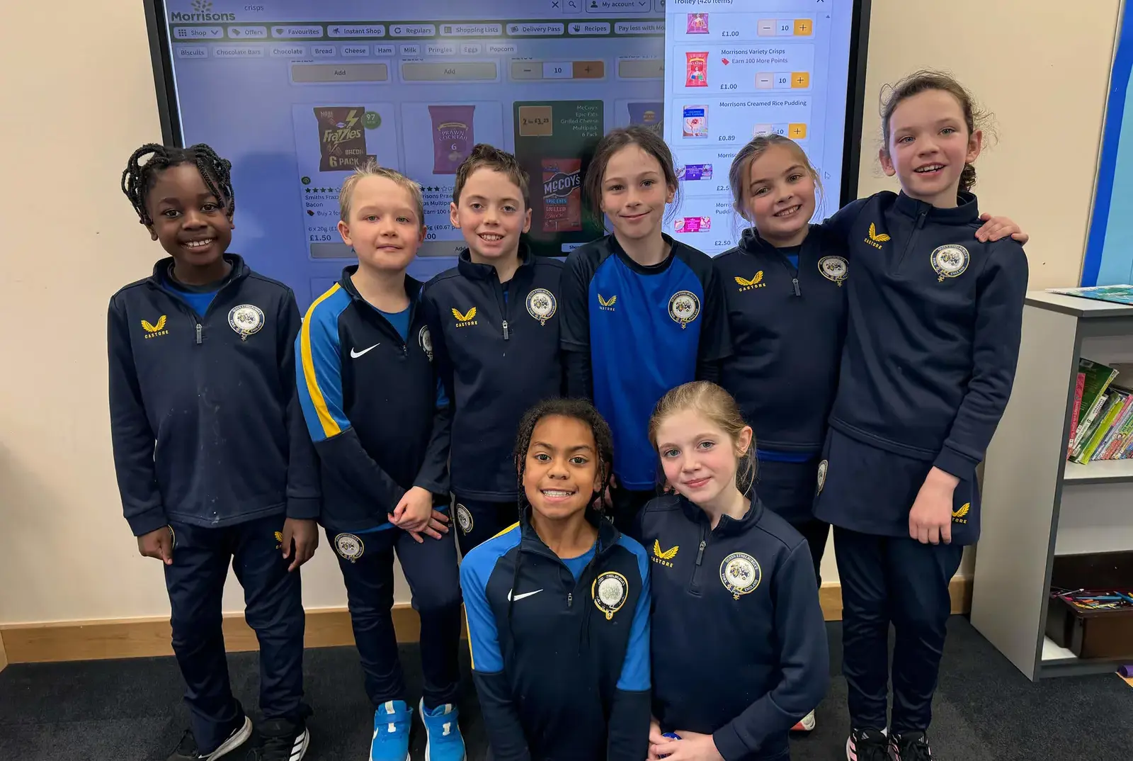 Students ordering a food shop for the food bank.