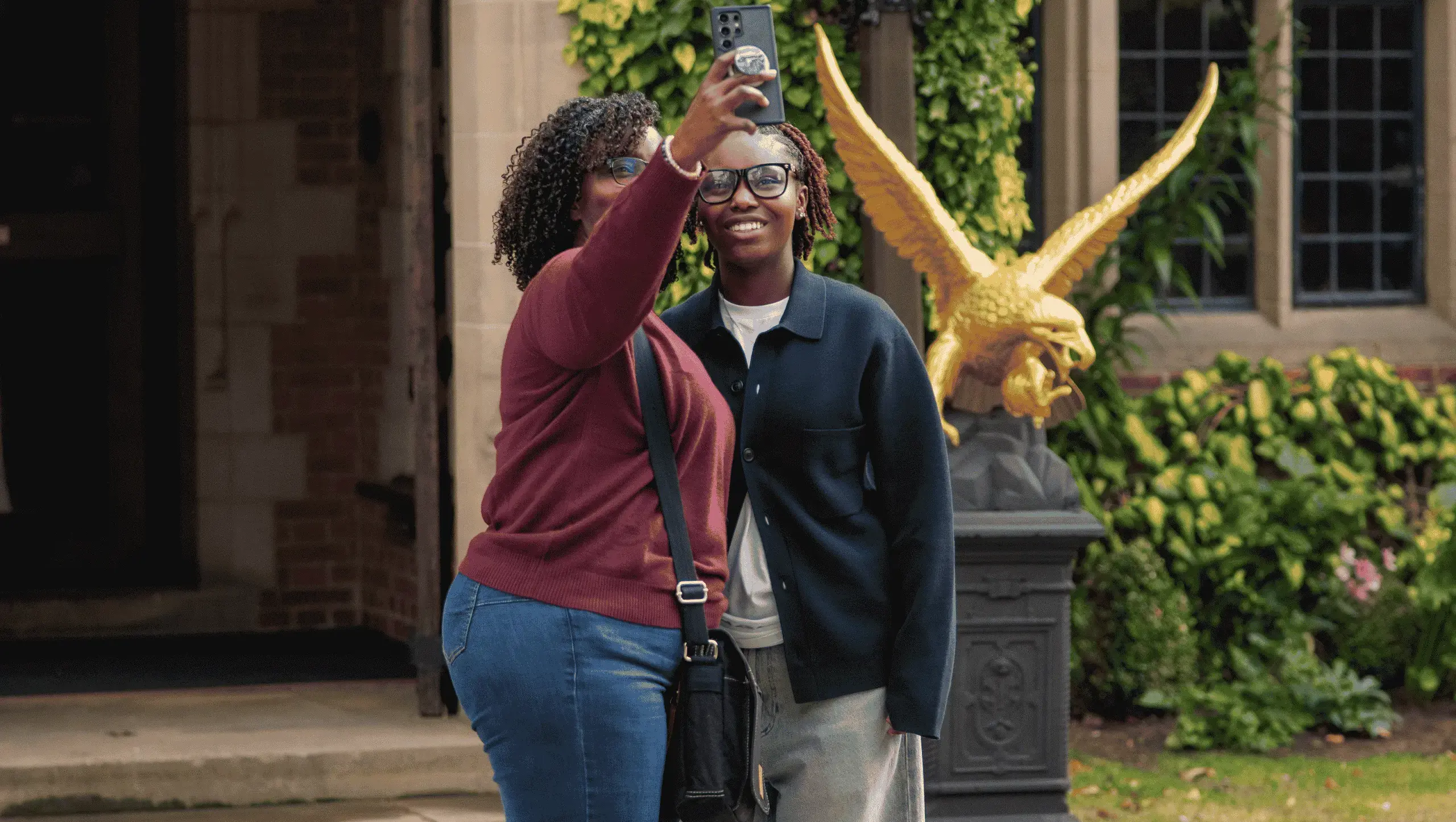 Mum and daughter posing outside of Armorial.