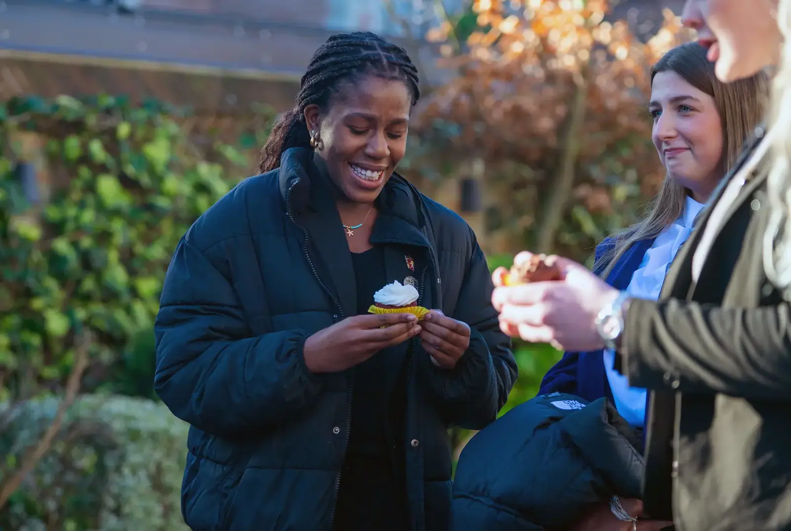 Students enjoying a celebratory cupcake after winning ISA Senior School of the Year.