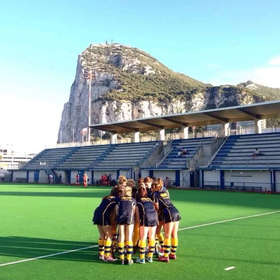 Ella playing hockey on tour.